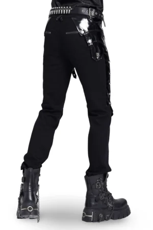 Black gothic punk pants rear three-quarter angle showing patent leather side seams and studs