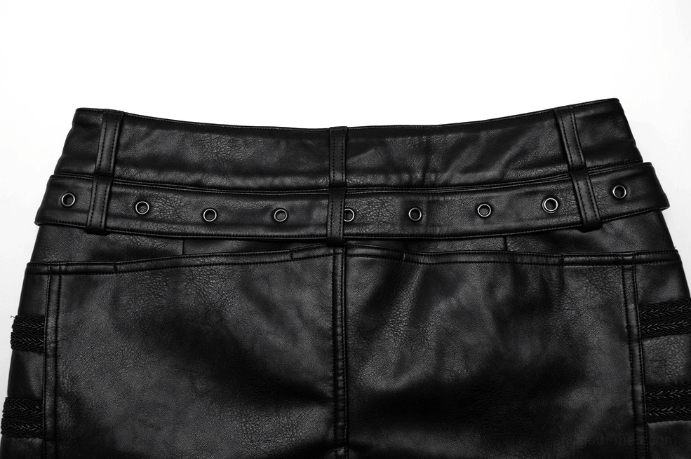 Close-up rear waist area of black studded gothic leather pants highlighting studded trim and back pocket seaming