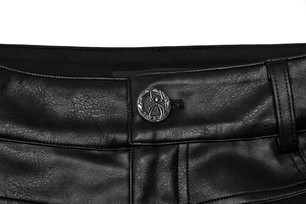 Close-up front waist detail of black gothic leather pants showing embossed metal button and belt loop construction