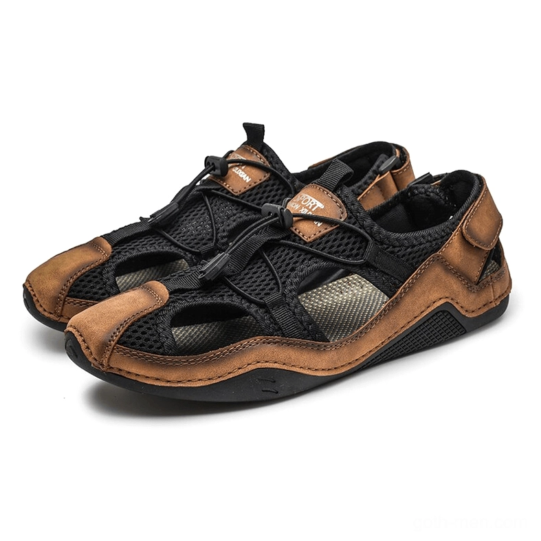 Men's gothic two-tone black and brown leather ankle-wrap sandals pair front view with leather toe cap