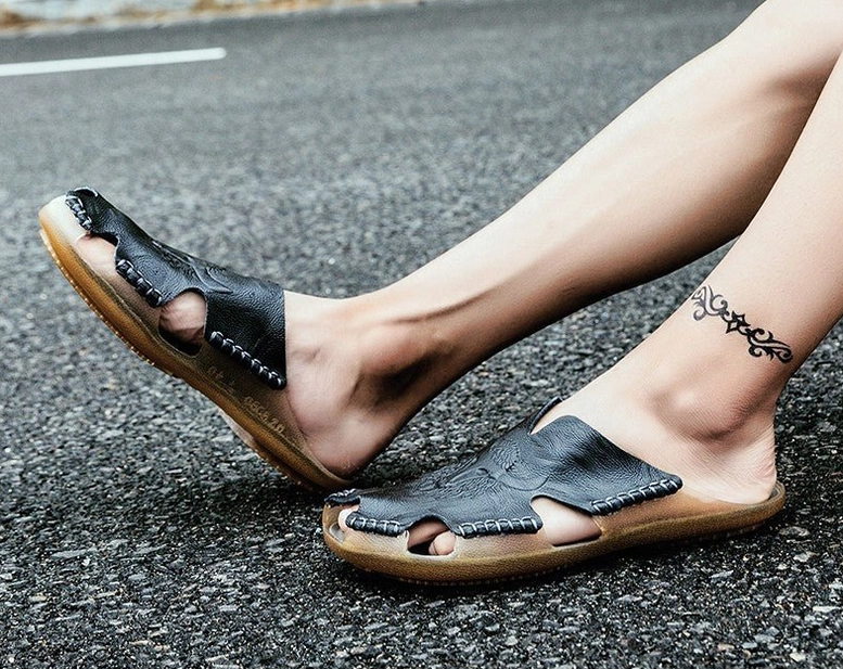 Gothic men's leather slide sandals close-up of leather craftsmanship and decorative stitching details