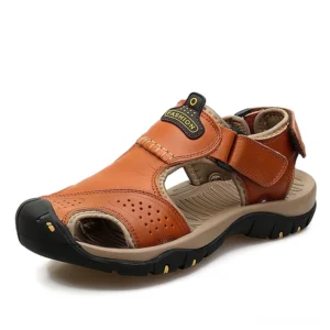 Tan orange genuine leather men's gothic sandals with branded vamp detail and breathable perforations, studio three-quarter angle