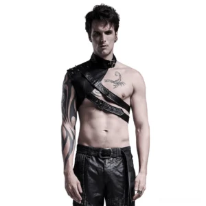 Gothic one-shoulder leather harness with metal rivets - front view on model with asymmetrical cross strap design