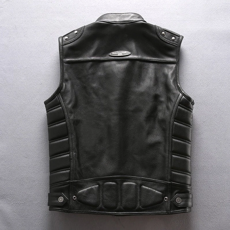 Black leather motorcycle vest rear flat lay with adjustable side buttons