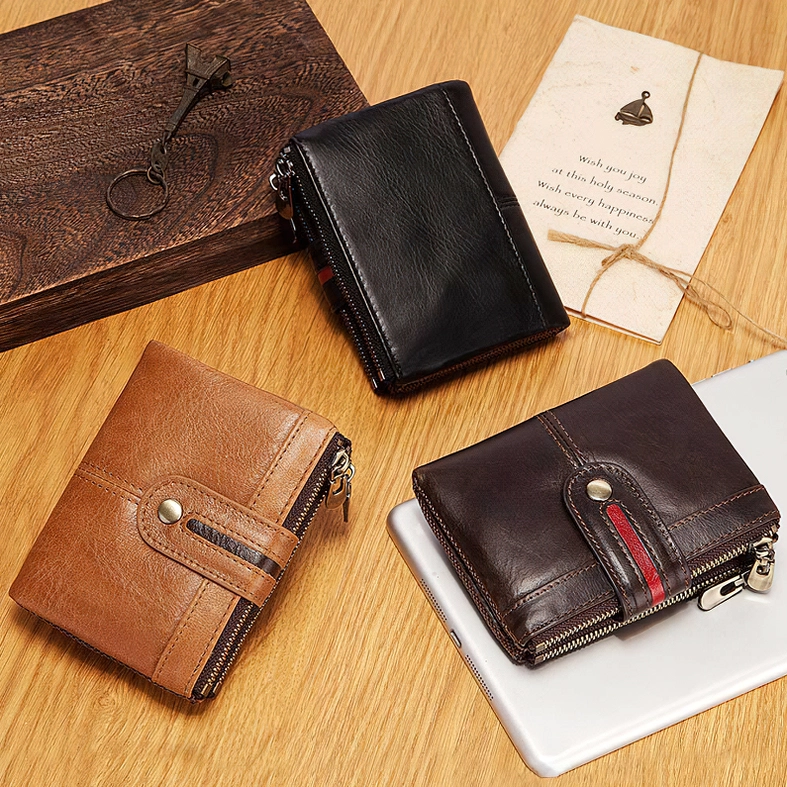 Stacked display of black, brown, and coffee genuine leather gothic wallets showing all available color options