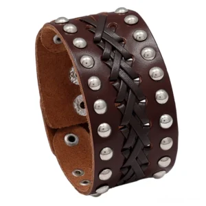 Brown genuine leather gothic bangle with handcrafted braided weave and gunmetal rivet embellishment, side angle view