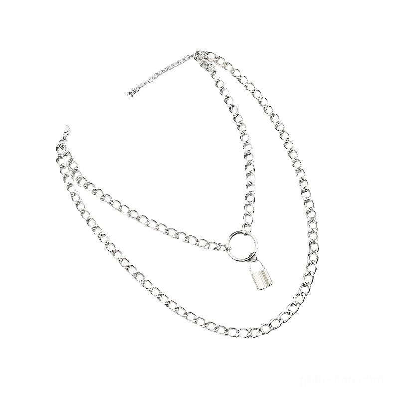 Dual-layer gothic chain necklace with lock pendant, side overhead view showing chain thickness variation and metal texture