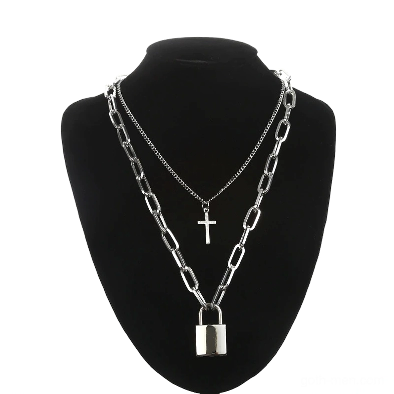 Gothic layered silver chain necklace with square lock and cross pendants displayed on black mannequin - front view