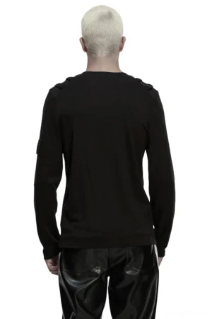 Black gothic long-sleeve cyberpunk top back view on model, worn with black leather pants
