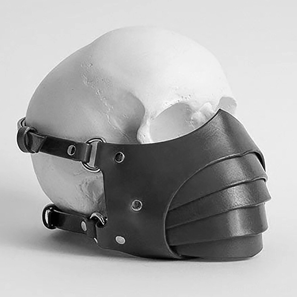 Gothic black leather face mask displayed on skull model, right side view highlighting layered mouth cover and metal hardware