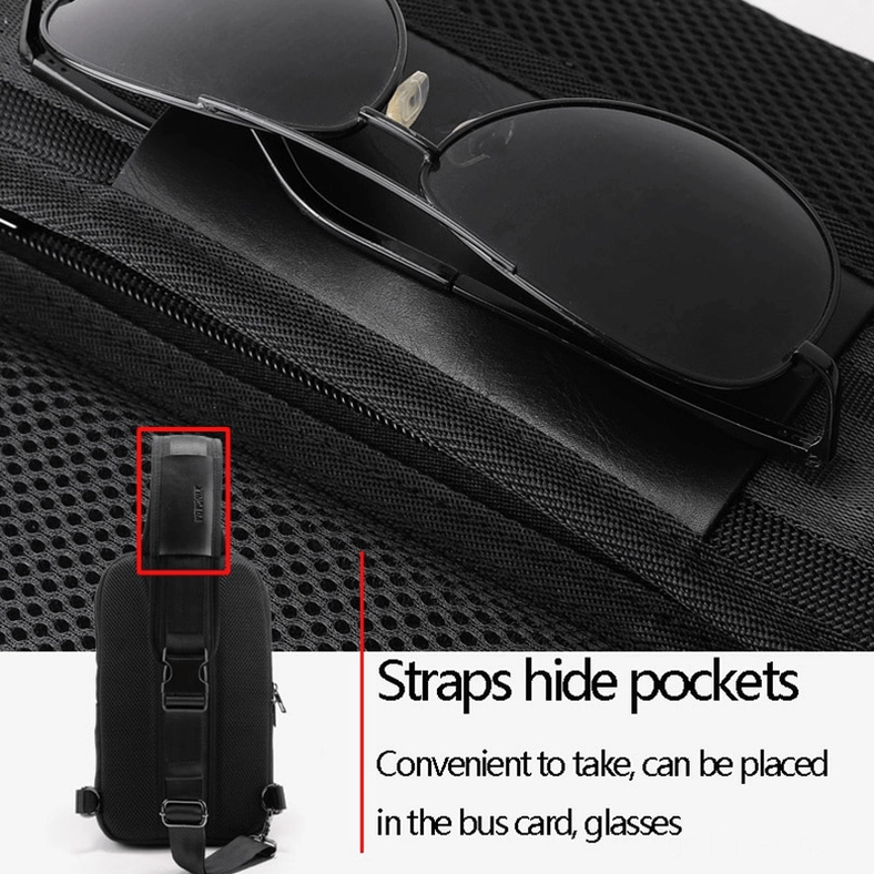 Adjustable padded strap and metal buckle hardware on mens sling crossbody bag detail view