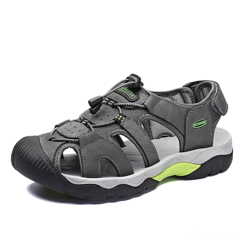 Dark grey gothic closed-toe men's sandals with green outsole accent and split leather upper