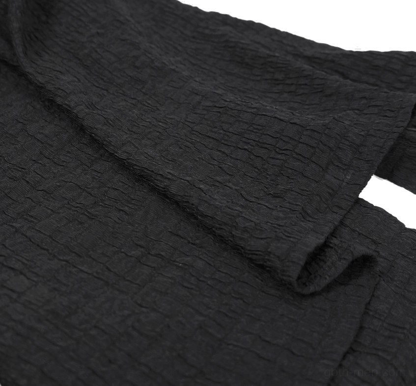 Black woven fabric texture and crinkled weave of gothic men's polyester blouse