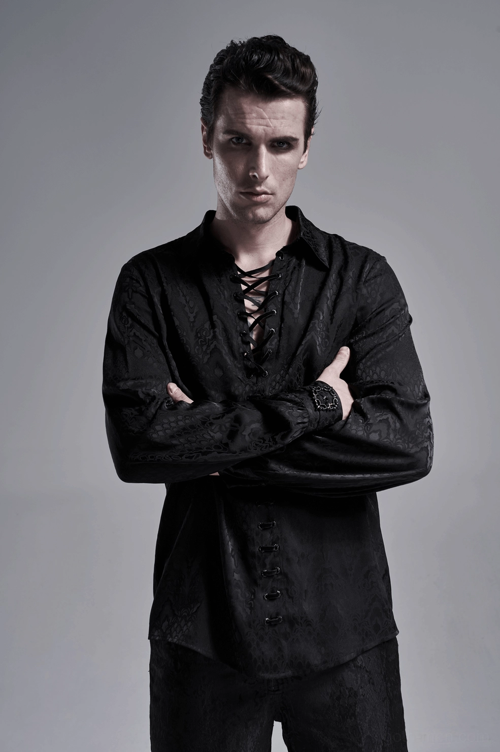 Gothic lace-up men's shirt showing hardware and lacing system detail