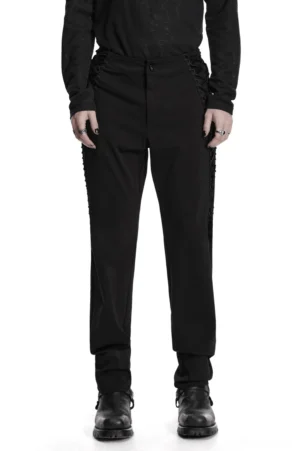 Man wearing gothic high-waist black slim pants with side lace-up detail, front full-body view showing tapered fit and elevated waistline