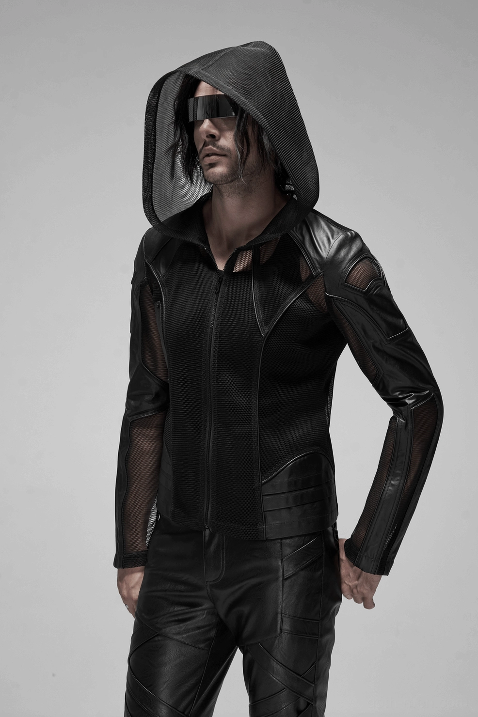 Avant-garde mesh leather hoodie fashion photography - dark gothic techwear for alternative menswear style inspiration