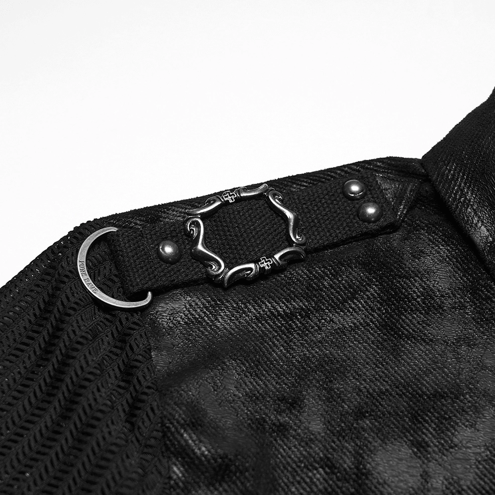 Close-up of gothic mesh shirt shoulder hardware, metal buckle D-ring, faux antique leather panel, and mesh fabric texture
