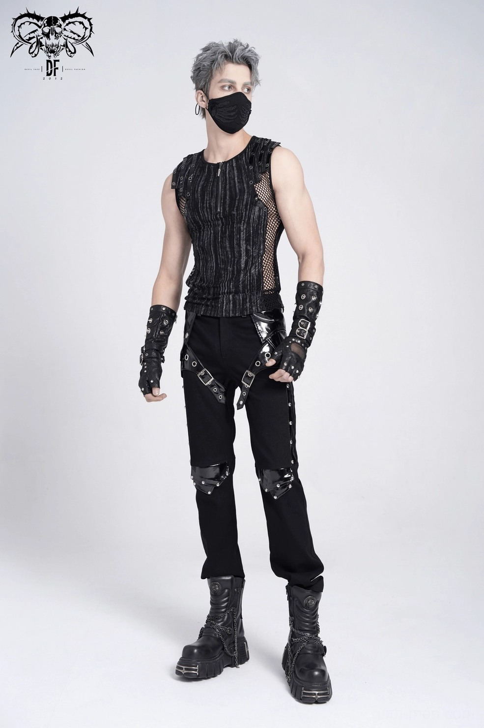 Alternative styling: gothic sleeveless tank top paired with dark fashion and alternative accessories