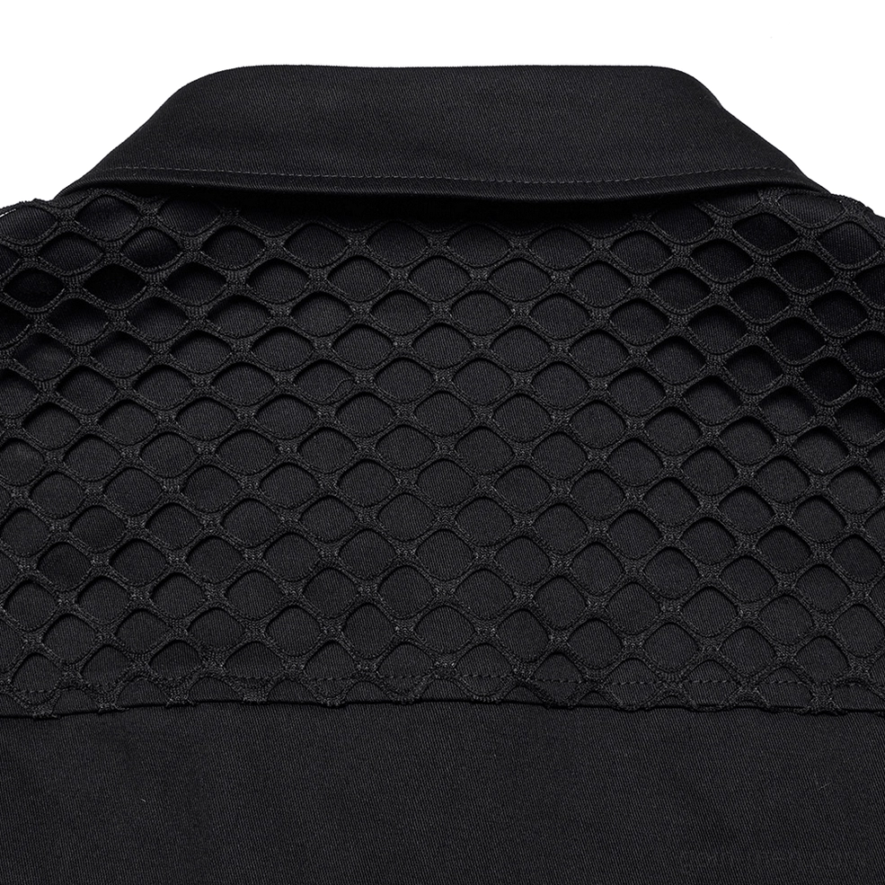 Honeycomb mesh panel texture detail on gothic cyberpunk shirt showing quilted stitched design