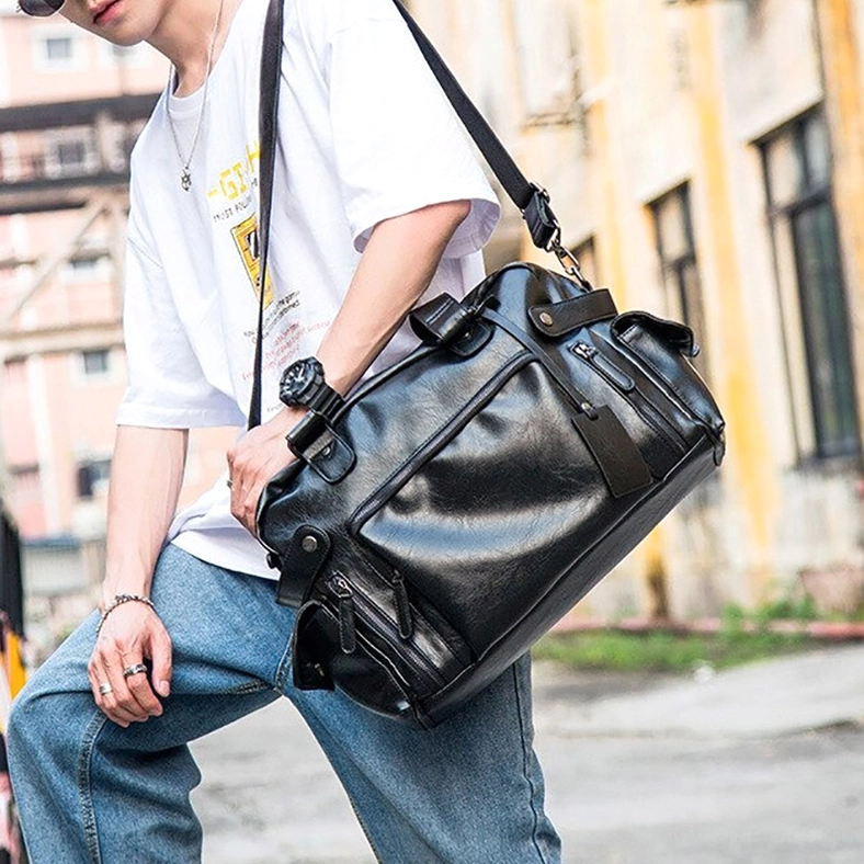 Gothic leather messenger bag showing premium PU material and structured compartment construction