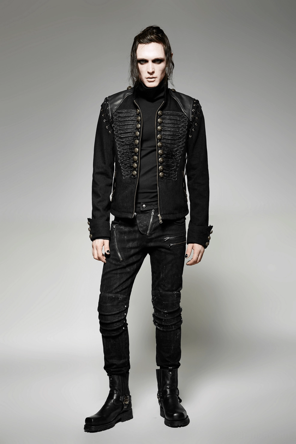 Gothic military jacket sleeve detail showing detachable attachment system and braided embellishment design
