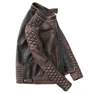 Vintage brown leather motorcycle jacket side profile showing quilted sleeves, ribbed hem and snap button collar details