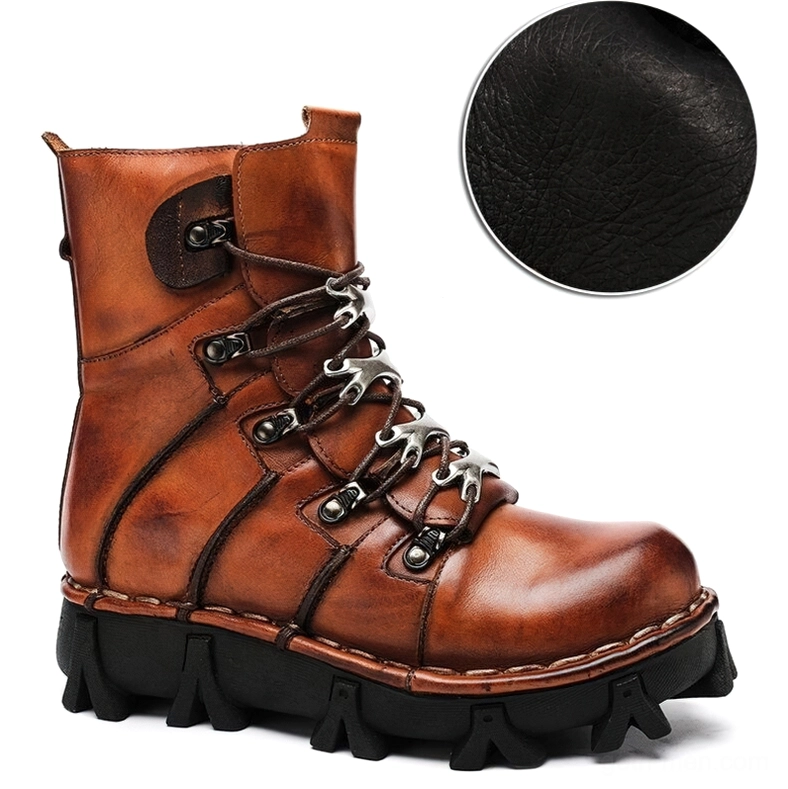Brown leather gothic motorcycle boots three-quarter side view emphasizing distressed vintage finish and natural leather aging patina