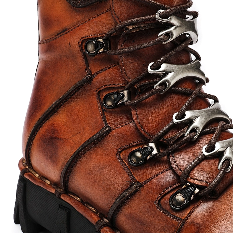 Black and brown gothic leather motorcycle boots collection showing both colorway options with metal hardware and chunky rubber outsoles