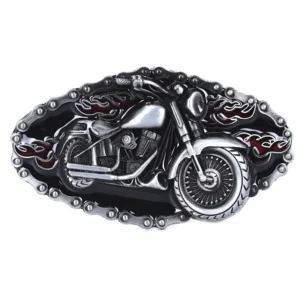 Flame and motorcycle embossed metal belt buckle with chain border detail, top-down flat lay view showcasing the 3D relief design and vintage silver-black finish