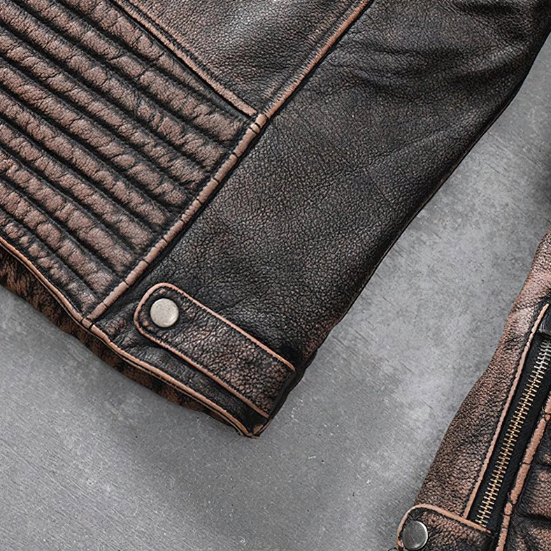 Distressed brown genuine leather motorcycle biker jacket showing all hardware, zippers and structural design elements