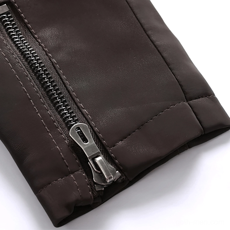 Stand collar and zipper details of gothic PU leather motorcycle jacket highlighting structured neckline design