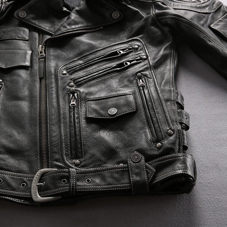 Black genuine leather gothic motorcycle jacket, construction detail view showing zipper placement and pocket design