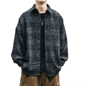 Gothic navy-gray plaid wool shirt for men with thick tartan weave and full-length sleeves, front view on male model