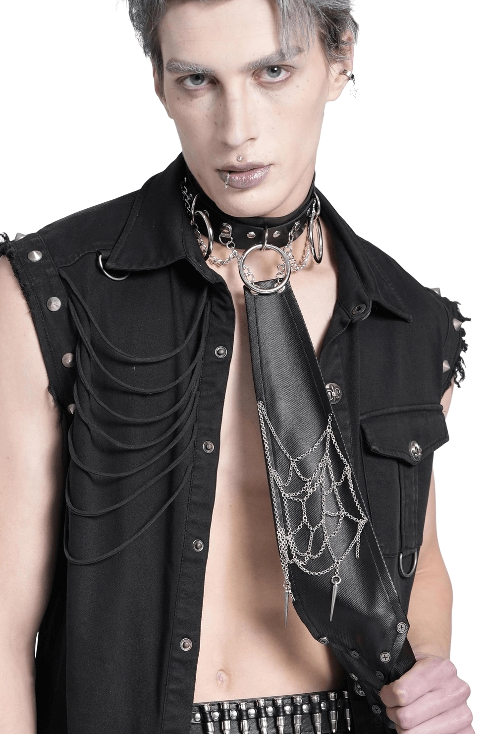 Close-up front view of gothic punk necktie with layered silver chains and metal ring collar detail on male model
