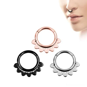 Gothic scalloped segment nose clicker ring worn on female model, silver finish with ornamental double-layer design
