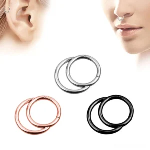 Gothic hinged segment nose clicker ring in three finishes - silver, black, and rose gold steel colors displayed on model