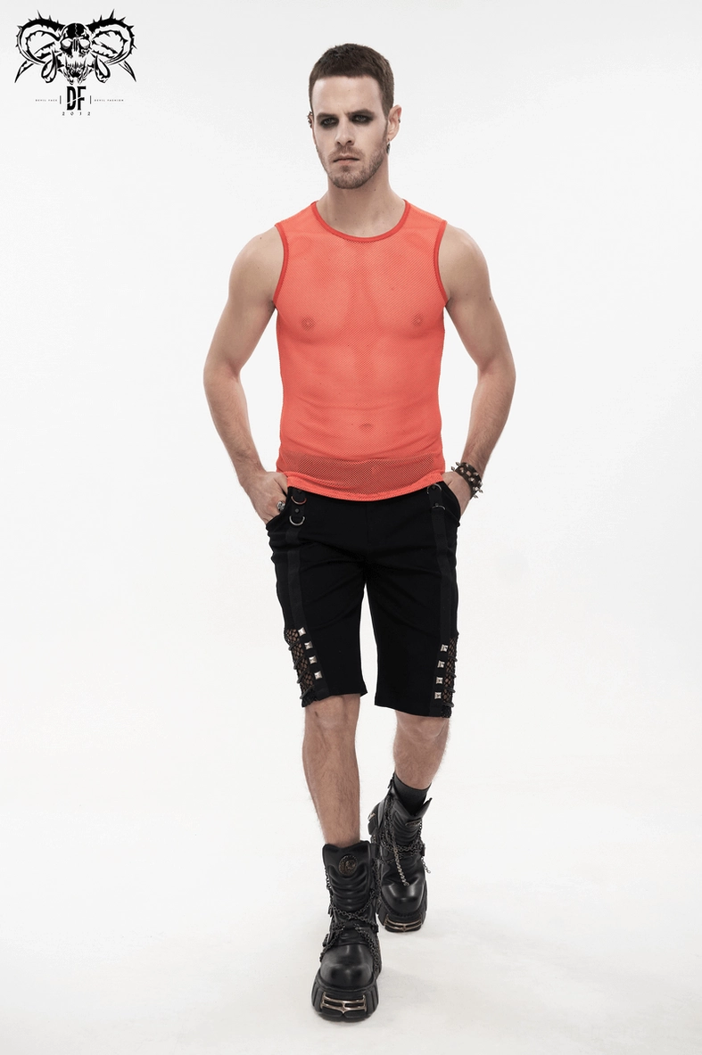 See-through orange mesh tank with studded shorts and biker boots - alternative punk look