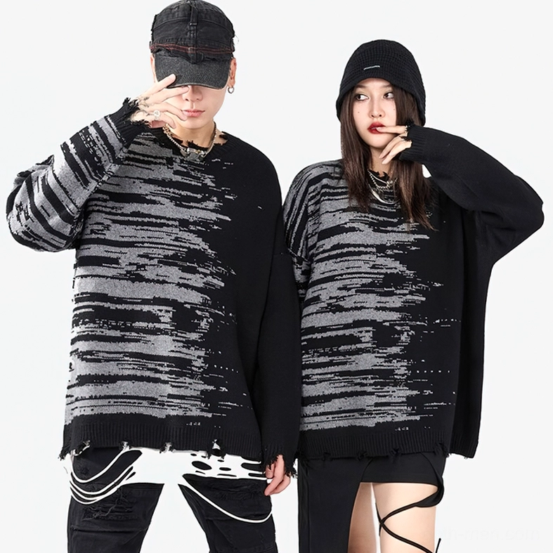 Gothic patchwork oversized knit sweater displayed on model showing streetwear aesthetic and relaxed fit