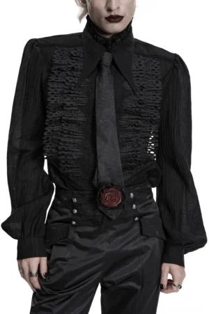 Androgynous male model wearing black gothic paisley necktie with burgundy rose accent paired with all-black goth outfit, front full-body shot in minimalist studio