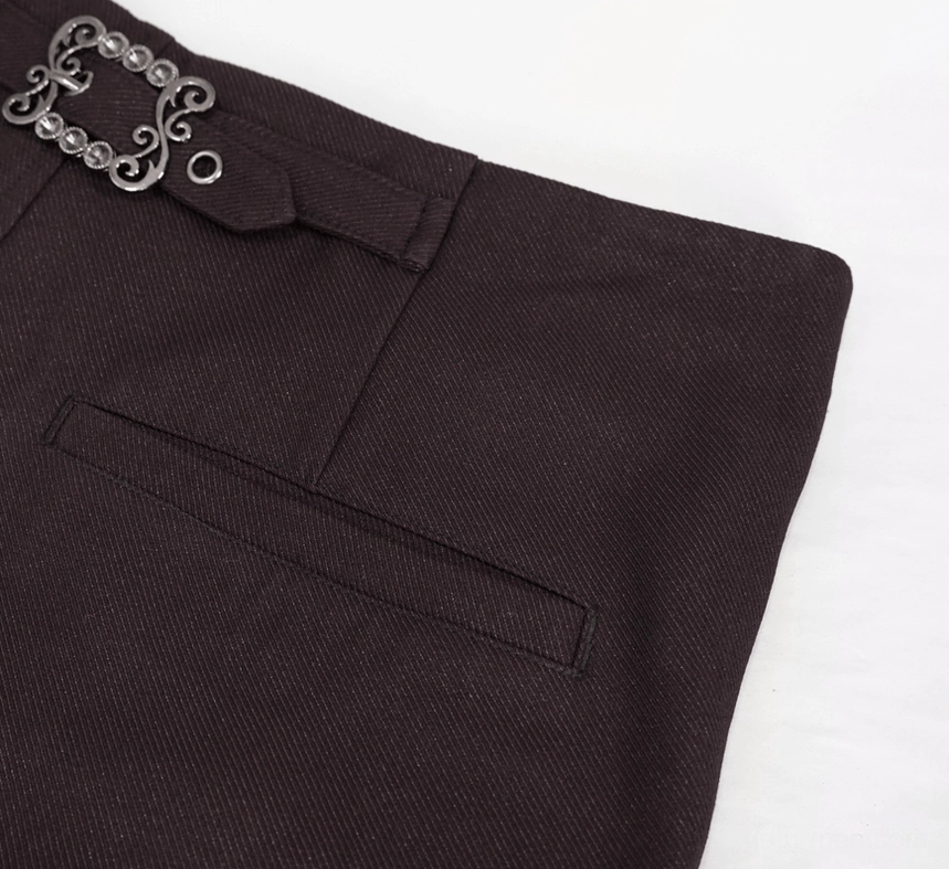 Close-up of structured back pocket with stitching detail and waist belt loop on wine red gothic slim-fit pants
