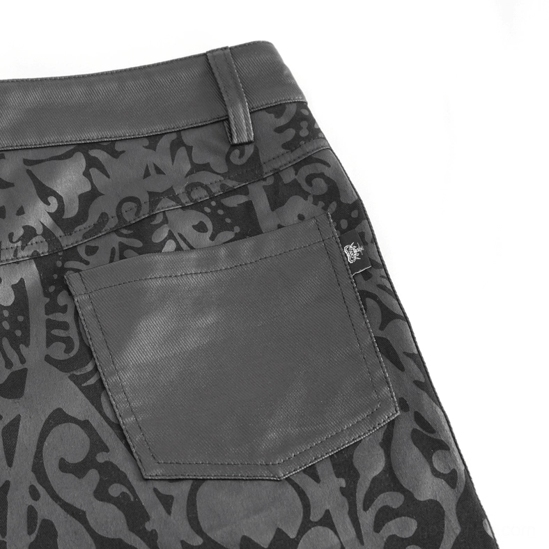 Back pocket leather patch detail with brand tag on men's gothic flared pants
