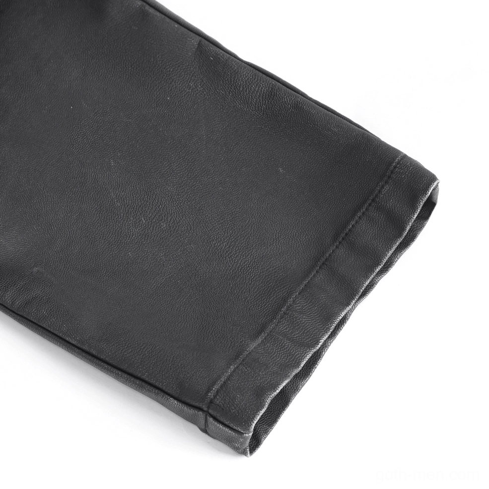 Black gothic leather pants detailed view of cargo pocket design, metal hardware, and functional strap arrangement for industrial style