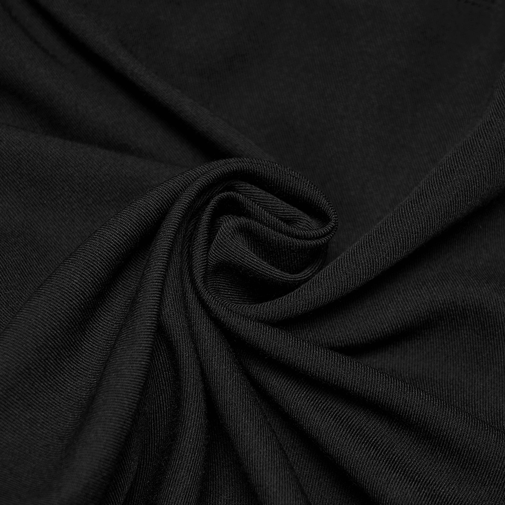 Black velvet embroidered gothic pants showing fabric composition and construction quality