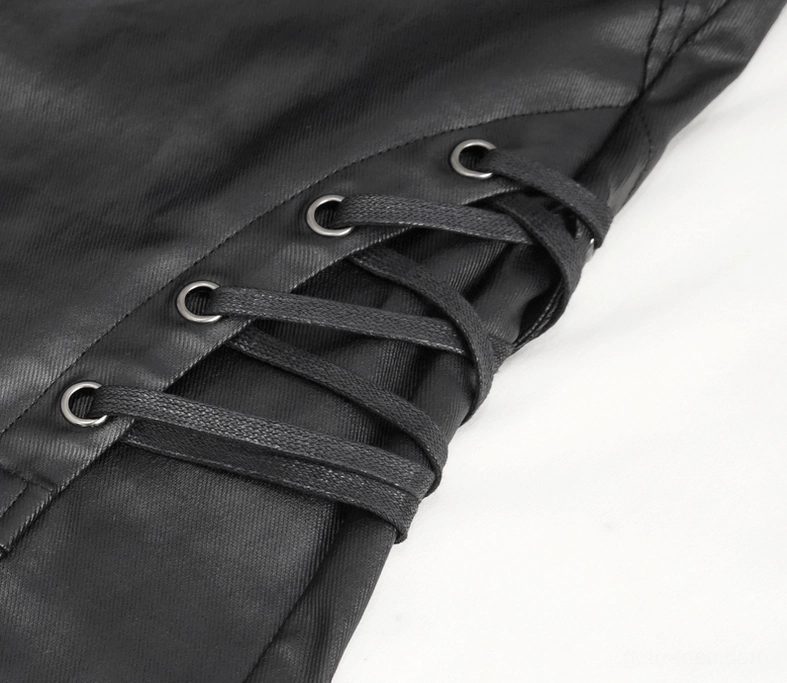 Close-up of knee lace-up strap with metal eyelets on gothic leather pants