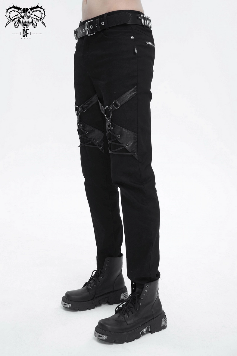 Gothic black leather harness pants highlighting metal hardware and industrial design elements