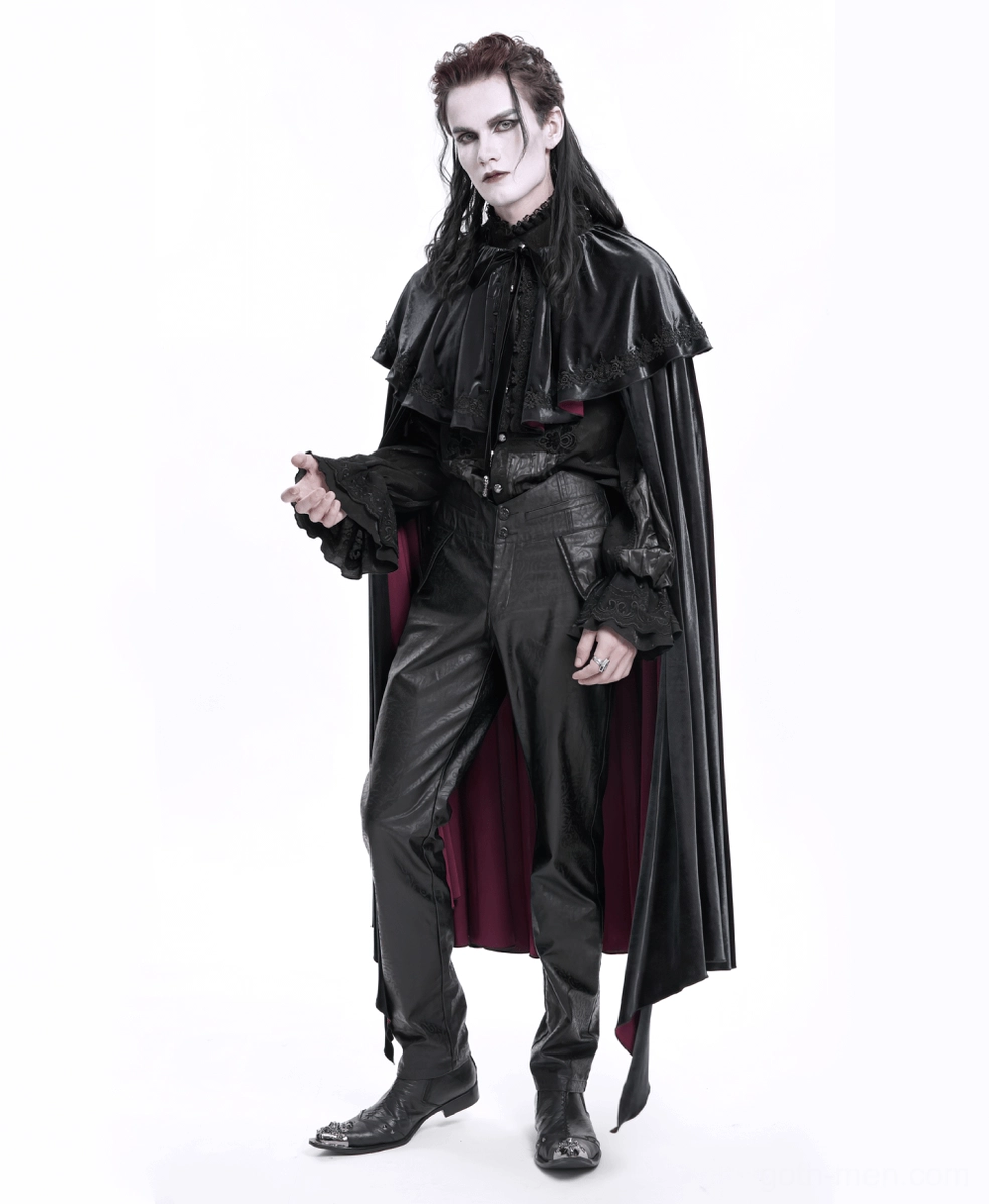 Detailed view of black gothic pants crotch seam and leg structure, showing precision tailoring and slim proportions