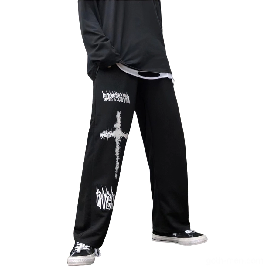 Gothic graffiti pants front three-quarter view with white text print and loose fit silhouette