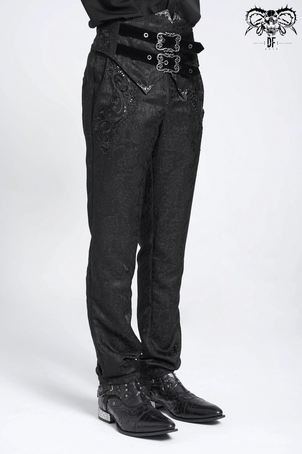 Men's gothic jacquard pants detail shot - close view of velvet corset back structure and hardware construction
