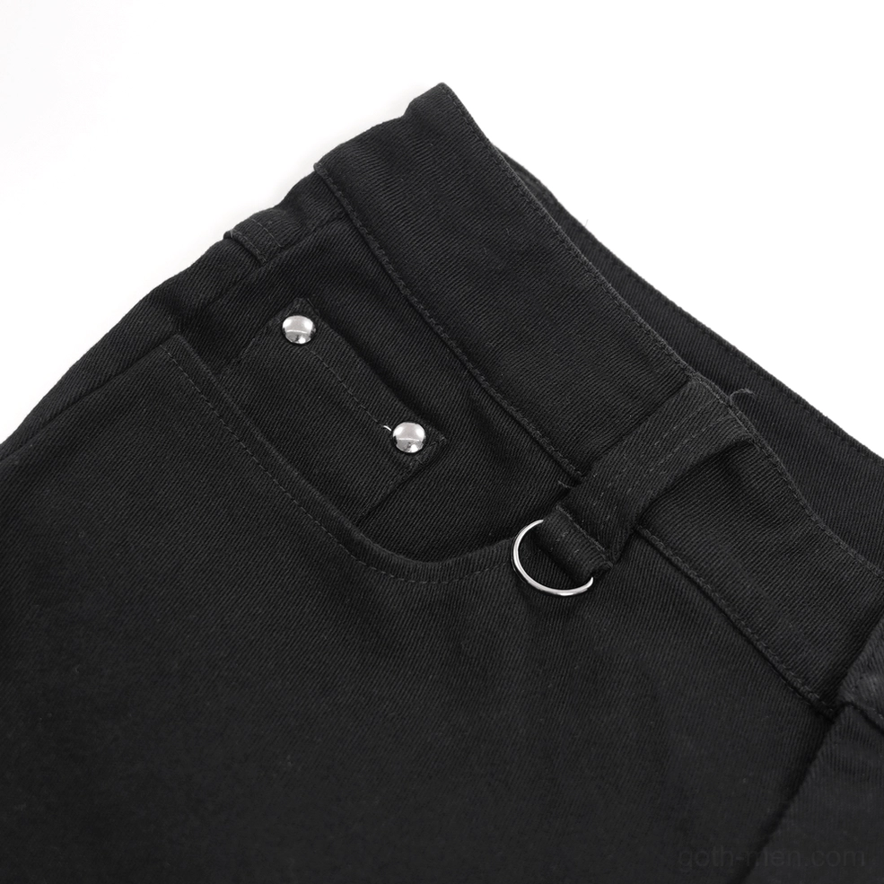Close-up detail of black gothic pants waist showing metal D-ring fasteners and rivet hardware