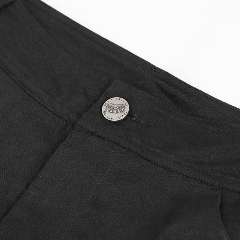 Close-up of black trouser waistband with embossed metal button closure and woven fabric